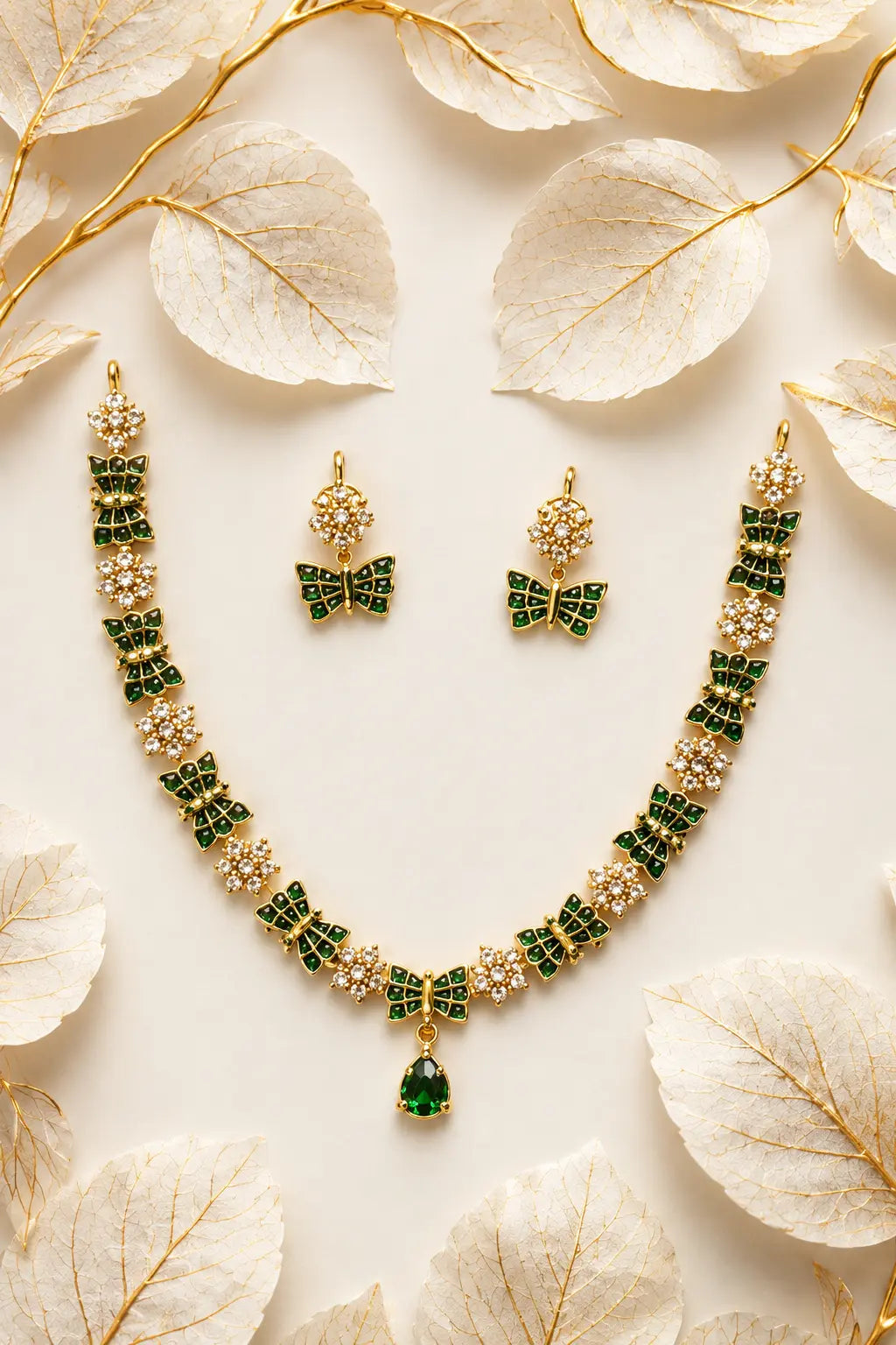 Golden Butterfly Jewelry With Emerald Accents