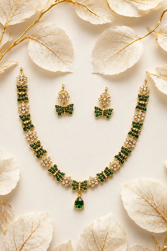 Golden Butterfly Jewelry With Emerald Accents