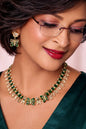 Elegant woman with butterfly jewelry