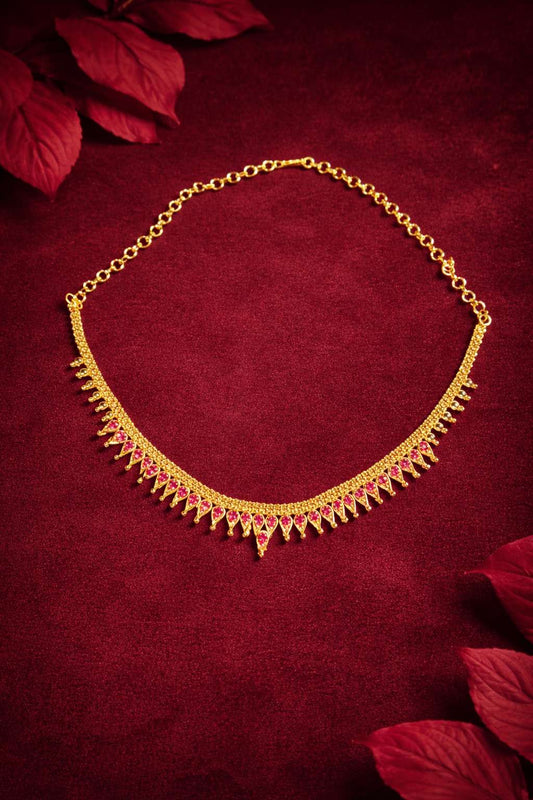 gold necklace with ruby pendant