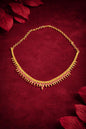 gold necklace with ruby pendant