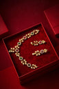 necklace with emerald and rsmall uby along ad